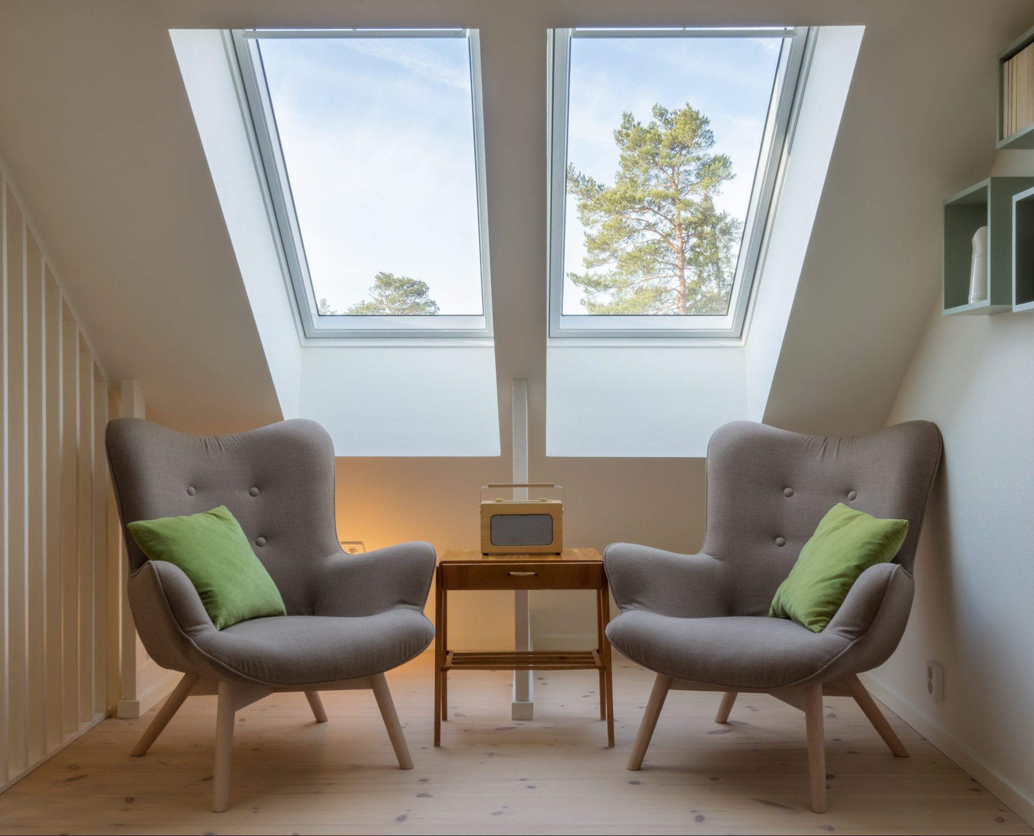 Solatube skylight in a common area of a house with chairs.